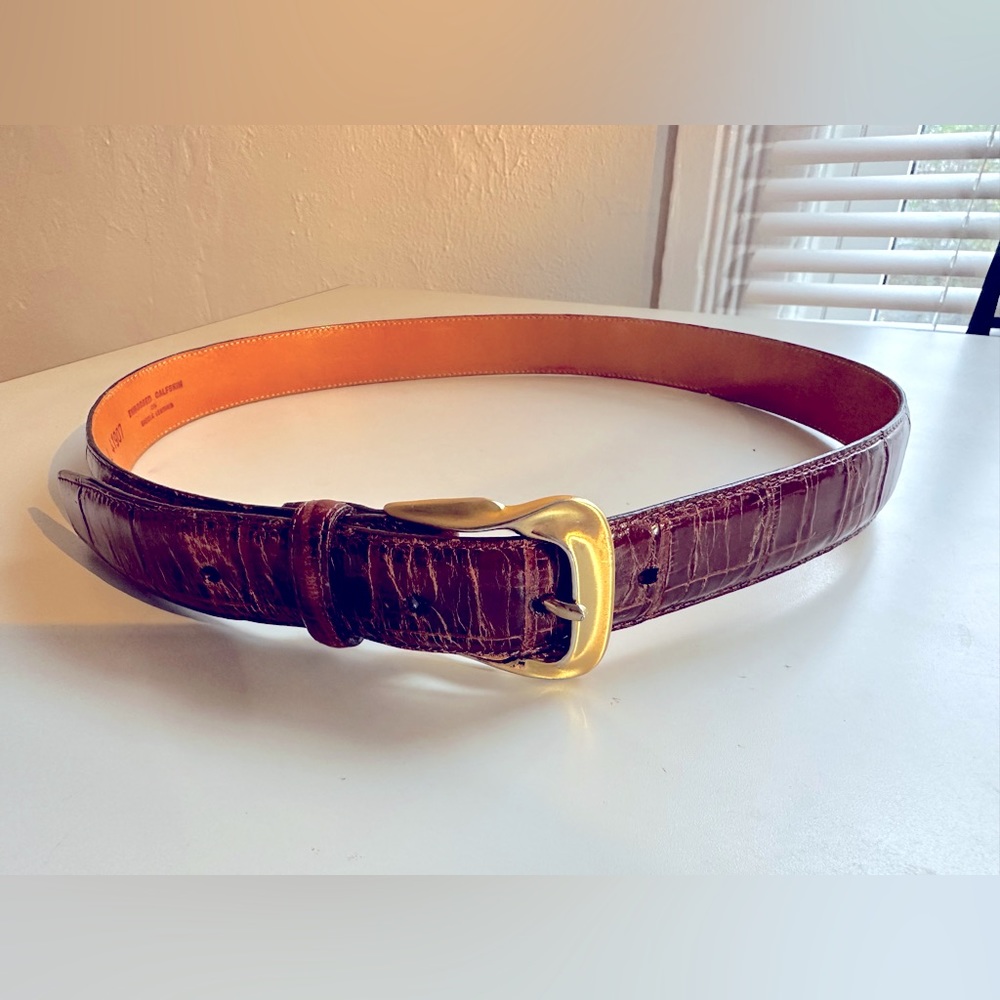 Women’s Vintage Brighton embossed leather belt with gold buckle. Size L